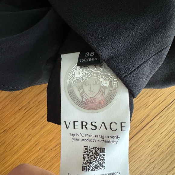 VERSACE MEDUSA CROPPED EMBELLISHED SATIN-TRIMMED CREPE TOP IN BLACK - Picture 5 of 5